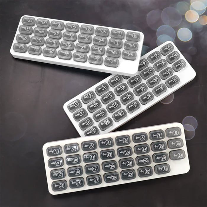 Overt Month Pill organizer with dates, practical & Bold design in Gray